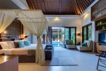 4. Lakshmi Villas Toba Bedroom one view to pool