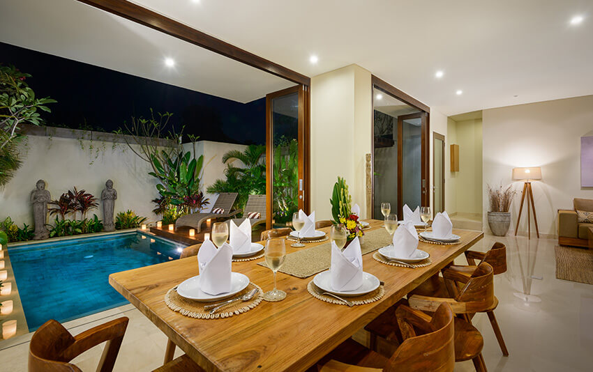 Villa-Sophia-Legian-Bali-Dining-table-overlooking-the-pool